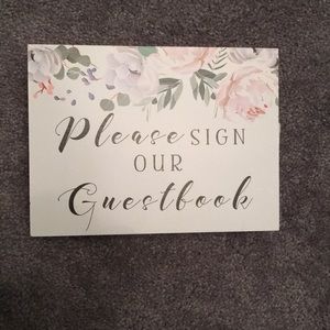 Please sign our guest book sign